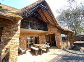Private Villa - Kruger Park Lodge, viešbutis mieste Heizivju