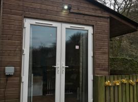 Ogdenclough fisherie log cabin, chalet di Rochdale