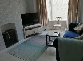 Seaside 2 bed terraced house with garden