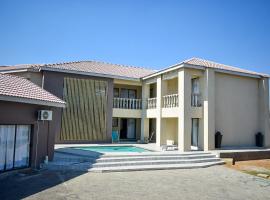 Protea Guesthouse، بيت ضيافة في نيوكاسل