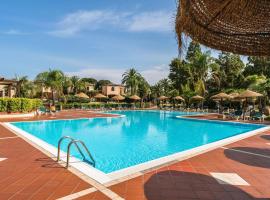 Apartments in residence with swimming pool in Santa Margherita di Pula, 250 meters from the sea