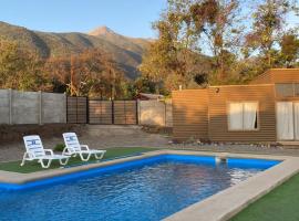 Cabaña en Olmue con piscina compartida, feriepark i Granizo
