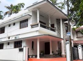 Hosted by Resmi Jayalal, apartamento en Kochi