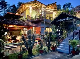 Coorg Sai Estate Ecobreeze Homestay, country house in Madikeri