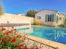 Villa récente de style réthais avec piscine chauffée et jardin paysager