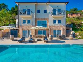 Villa Esarjo with Heated Pool and Sea View, hotel in Veprinac