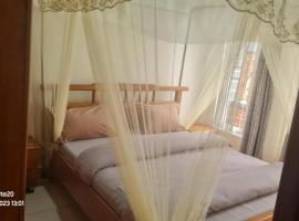 Room in Guest room - Charming Room in Kayove, Rwanda - Your Perfect Getaway, hostal o pensión en Kayove