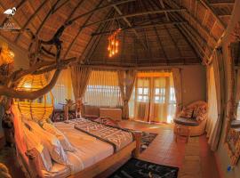 Lake Munyanyange Caves Lodge, family hotel in Kasese