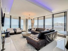 Oceanfront View Wrap Around Balcony Luxury Corner Unit Ebb Tide 401，新士麥那海灘的豪華飯店