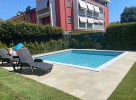 Appartamento incantevole,piscina ad uso esclusivo, hotel in Turate