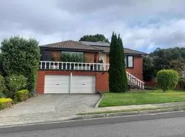 Walk to Beaches and Shops Central to the City and Airport
