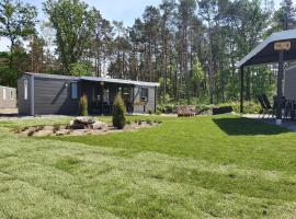 Ferienpark Auf dem Simpel - Heide-Lodge 4, glamping site sa Soltau