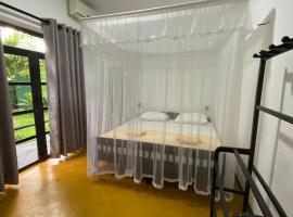 Pearl Villa Rooms and Hostel, hostal en Unawatuna