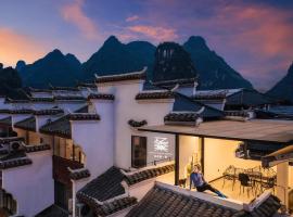 Yangshuo EMOJI YOUTH HOSTEL, hotel v destinaci Jang-šuo