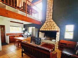 Verregaande Cottage with hot tub, hotel v destinaci Agulhas