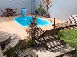 Chalé Aconchego, hotel with pools in Camaratuba