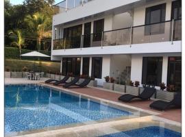 Villa Campestre Numbana Melgar: Melgar'da bir havuzlu otel