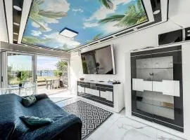 Studio Prestige avec terrasse, île des pêcheurs, Vue port