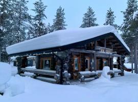 Kaupinpirtti, Ylläs - Silver Log Cabin with Lake and Fell Scenery, chalet de montaña en Äkäslompolo