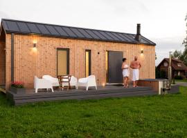 Cozy houses - Sauga Fishing Village riverside holiday center, holiday home in Pärnu