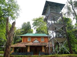 Cocooonroyale Mudhouse, hotel with parking in Chekadi