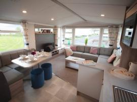 Sandylands Holiday Home, vil·la a Stevenston