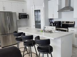 Chesskings Suites - Polo-Park - 2 Bedrooms - Executive, apartment in Winnipeg