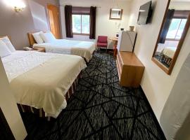 Woodland Inn & Suites, motel i Medford