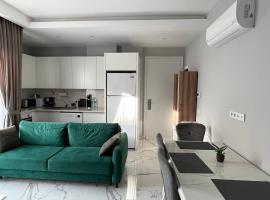 The Yacht apartments, жилье для отдыха в городе Аланья