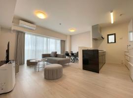 ＆Monde. Okinawa Arena Condominium, acomoda&ccedil;&atilde;o com cozinha em Okinawa