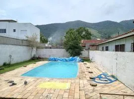 Casa com piscina perto da praia