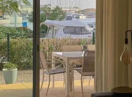 Face au bateaux, Neuf, 2 chambres , jardin