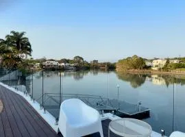 Spacious waterfront home with pontoon, pool, BBQ