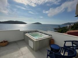 La Menorca Beach House, hótel með jacuzzi-potti í Arraial do Cabo