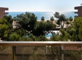 AT049 Els Pins, primera línea de la playa con piscina y barbacoa