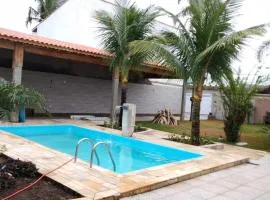 Piscina 6 QUARTOS 300mPRAIA jardim churrasqueira 16 PESSOAS garagem 3 carros Monitoramento 24 horas Mesa de sinuca