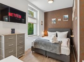 Vorstadtoase für 3 - Queensize-Bett, Schlafcouch, Parkplatz & Netflix - Nähe BER, hotel v destinaci Eichwalde