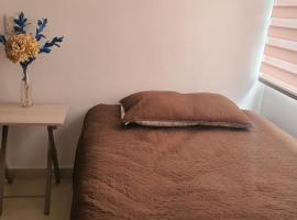 Habitación en apartamento compartido en Envigado, sted med privat overnatting i Envigado