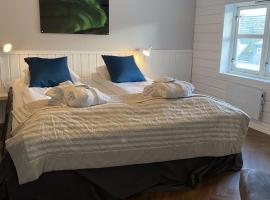 Enter Tromsø - Luxury 4 Bedroom Apartment, lägenhetshotell i Tromsö
