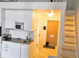 Loft next to train station & close to airport