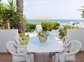 Frederic - Casa adosada en l Ampolla con jardin y vistas al mar - Deltavacaciones, hotel a l'Ampolla