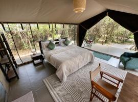 Olkinyei Mara Tented Camp, cabin in Talek