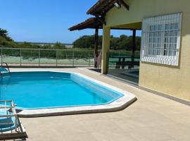 Casa beira rio-mar, Hotel mit Pools in Barra de São Miguel