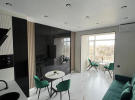 Дизайнерская квартира ЖК Шанырак 33, place to stay in Pavlodar