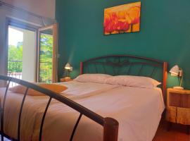 Le camere dell'Albero Bianco con uso cucina, hotel murah di Manzano