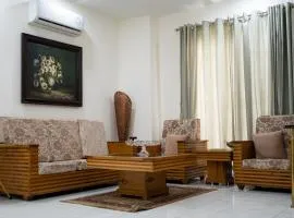 Gulberg Luxe Living 2-BR Apartment