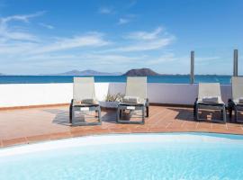 Corralejo Beachfront Villa Remos with Lobos Island View, Private Pool, Wifi & BBQ by Amazzzing Travel