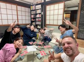 角島シェア&ゲストハウスSumikkoオーシャンビューの犬がいるゲストハウスで特別な交流体験個室とドミトリー, hotel v destinaci Tsunoshima