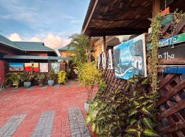 Travellers Home (Kifumbu), hotel u blizini znamenitosti 'Trgovački centar Mlimani City' u gradu 'Dar es Salaam'
