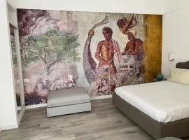 Soggiorno tra storia e design - la Domus